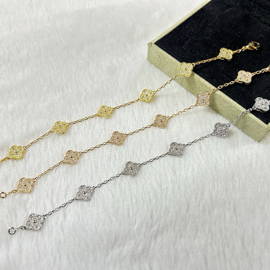 [Raffine] DIAMANTARMBAND MIT KLEEBLATT UND 6 MOTIV