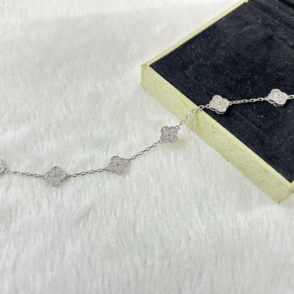 [Raffine] DIAMANTARMBAND MIT KLEEBLATT UND 6 MOTIV